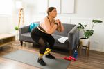 Women working out in living room 