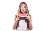 Woman eating a watermelon