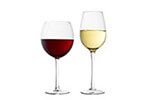 Two wine glasses, one filled with red wine and the other white