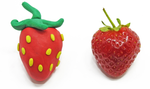 Close ups of a strawberry made of playdough and a real strawberry