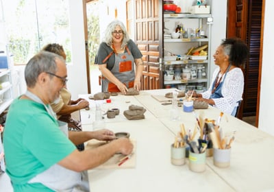 Small group participates in a pottery class