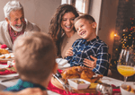 family enjoying Christmas meal