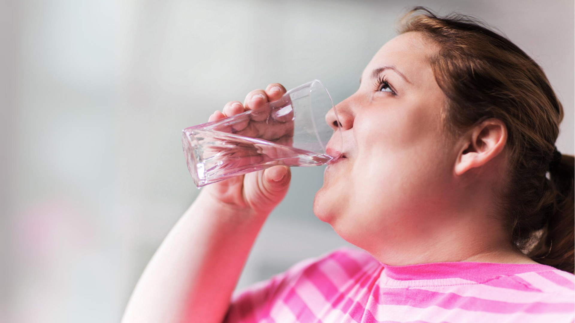 Woman drinks water