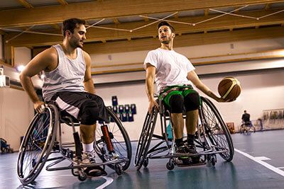 People playing wheelchair basketball