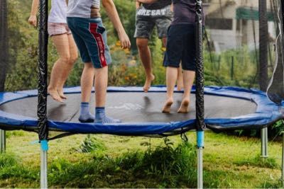 Kids playing on a trampoline