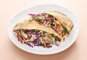 Pita bread with coleslaw and chicken salad